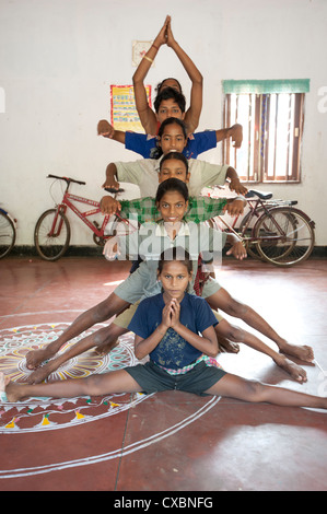 Young boys being trained as female Gotipua dancers performing in praise of Lord Jagannath and Lord Krishna, Raghurajpur, Orissa Stock Photo