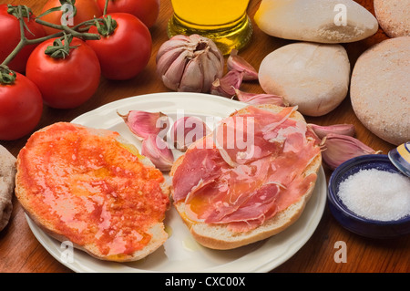 Andalucia typical breakfast of muffins with ham tomato and garlic oil
