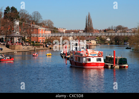 Boats and suspension bridge over the River Dee, Chester, Cheshire, England, United Kingdom, Europe Stock Photo