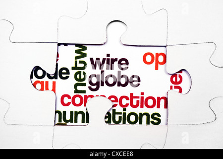 Wire globe text on puzzle Stock Photo