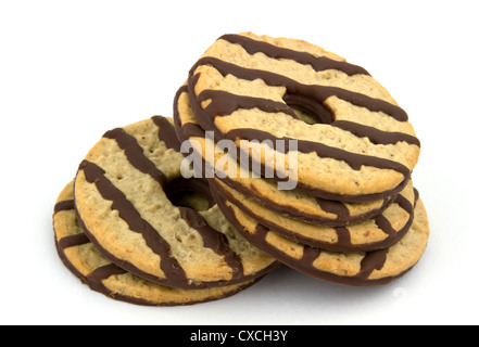 Heap of delicious chocolate striped cookies isolated on white background. Stock Photo