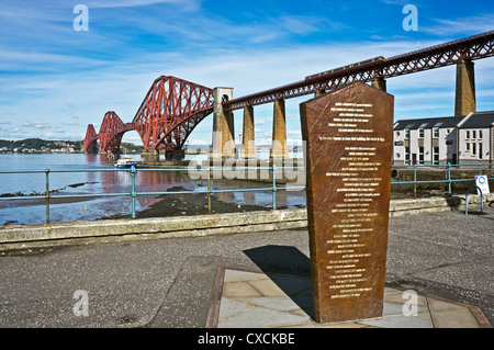 Forth Rail bridge viewed from South Queensferry with newly erected memorial right and The Forth Belle taking on passengers Stock Photo