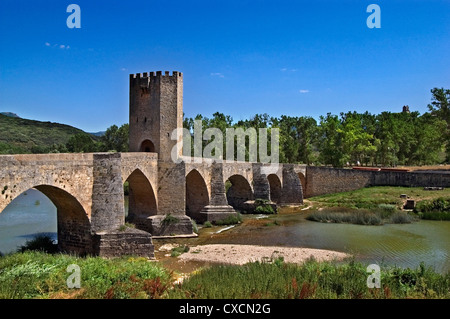 Medieval bridge over the river Ebro and fourteenth century tower Frias Burgos Castile Leon Spain Stock Photo