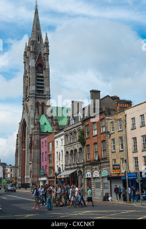 Dublin street scene with St. Augustine and St. John's Church, Thomas St, Republic of Ireland. Stock Photo