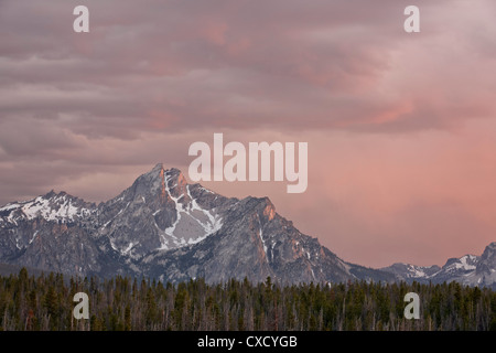 Pink clouds at sunset over The Sawtooth Mountains, Sawtooth National Recreation Area, Idaho, United States of America Stock Photo