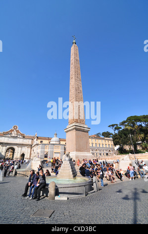 Rome, Italy - 30 March, 2012: Tourists visiting Piazza del Popolo ('s Square), a large urban square and touristic attraction Stock Photo