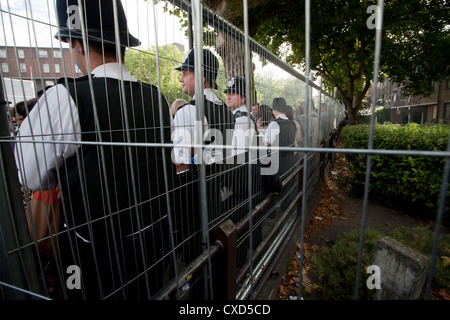 Notting Hill Carnival, 27/08/2012, Lined up policemen at Notting Hill during the Carnival celebration, London, UK Stock Photo