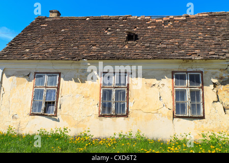 Abandoned old house (detail view) on sunny day Stock Photo