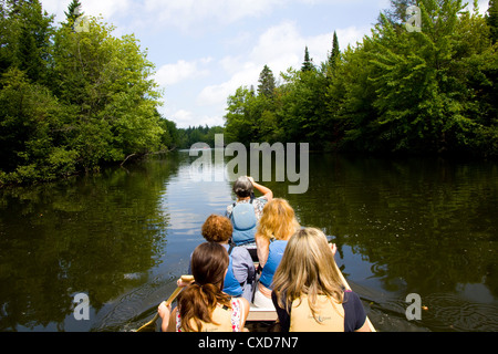 Canoe tour along the Akiawenrahk (Saint-Charles) River which threads through the Wendat (Huron) community of Wendake, Canada Stock Photo