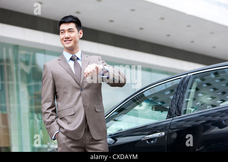 Young businessman and car Stock Photo