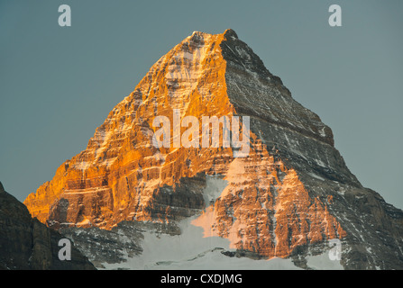 Sunrise on Mt. Assiniboine from Magog Lake, Mt. Assiniboine Provincial Park, British Columbia, Canada SEPTEMBER Stock Photo