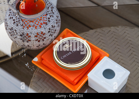 Caviar tin box displayed on table Stock Photo