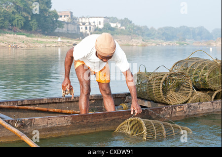 Washing the Fishing Net at Thevara, Cochin, Kerala, India