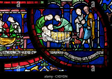 Medieval stained glass depicting the Plague, Trinity Chapel Ambulatory, Canterbury Cathedral, Kent Stock Photo