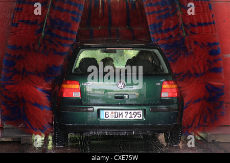 Berlin children sitting in a car in a car wash Stock Photo