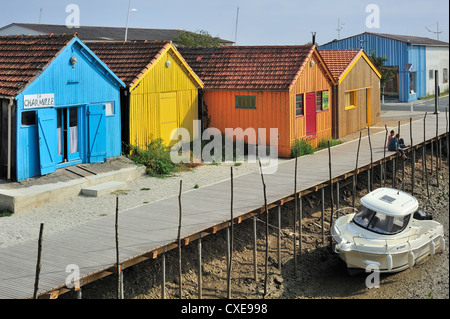 Colourful cabins of oyster farmers in the harbour at Le Château-d'Oléron on the island Ile d'Oléron, Charente Maritime, France Stock Photo