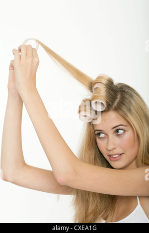Image result for teen girl doing her hair