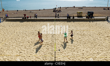 Beach volleyball being played on Brighton seafront Stock Photo