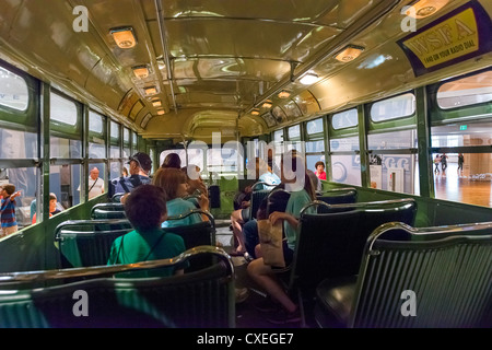 Tourists on the bus on which Rosa Parks refused to give up her seat, The Henry Ford Museum, Dearborn, Detroit, Michigan, USA Stock Photo