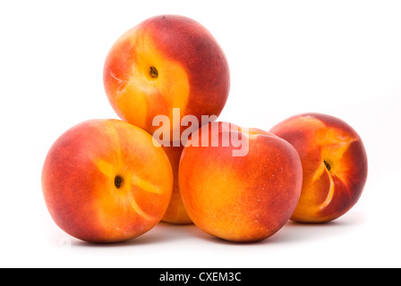 Juicy nectarines on a white background Stock Photo