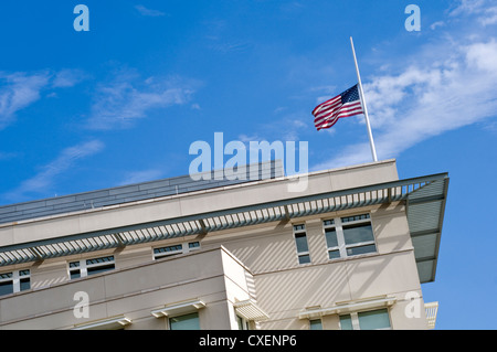 The American flag flying at half mast over the US Embassy in Berlin, Germany
