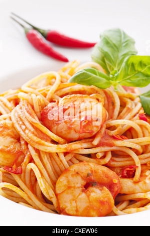 Spaghetti diablo with prawns Stock Photo