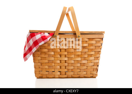 Wicker picnic basket with red gingham Stock Photo