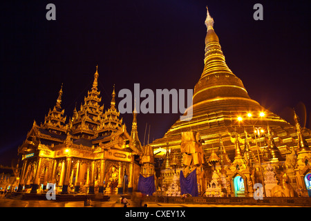 The main ZEDI of the SHWEDAGON PAYA or PAGODA which dates from 1485 is gilded every year - YANGON, MYANAMAR Stock Photo