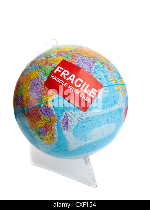 Globe with a fragile sticker on a white background Stock Photo