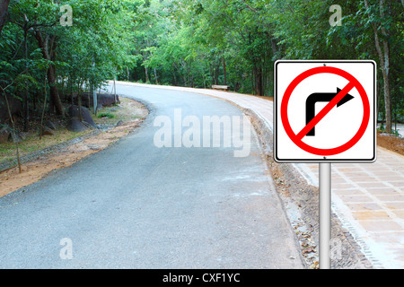 don't turn right sign with a left curved road background Stock Photo