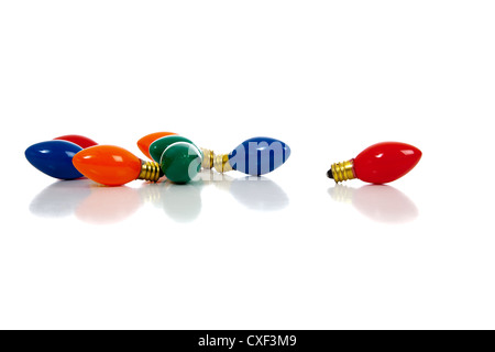Various colored Christmas light bulbs in a white background with copy space Stock Photo