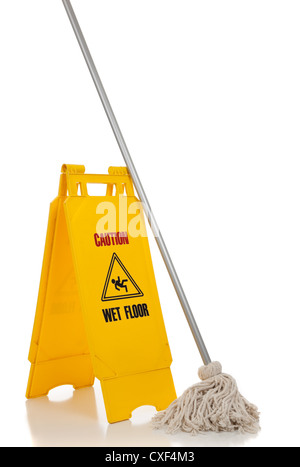 'Caution wet floor' sign with a string mop on a white background Stock Photo