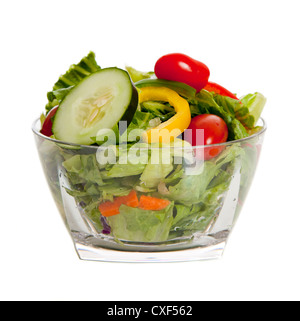 Tossed salad in a clear glass bowl on a white background Stock Photo