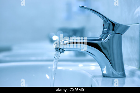 Water dripping from water faucet, closeup Stock Photo