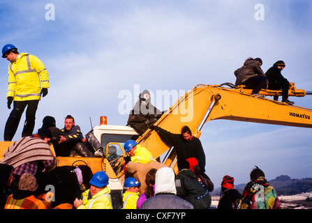 Twyford down road protest , the first digger diving actions M3 extension Winchester. Stock Photo