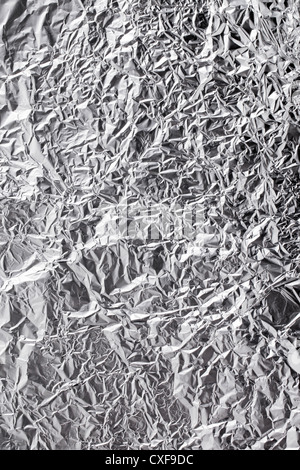 Background texture of wrinkled aluminium foil. Stock Photo