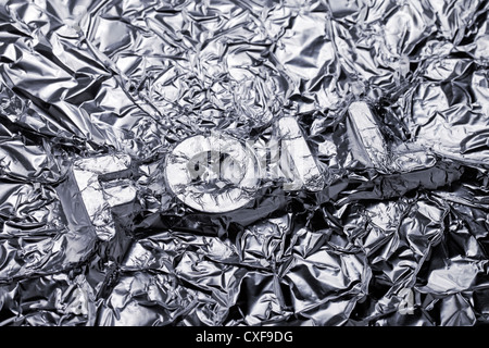 Word Foil covered with aluminium foil. Stock Photo
