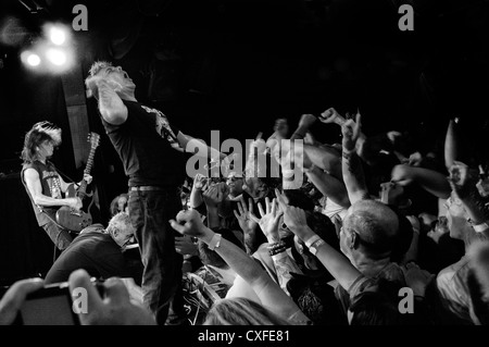 black and white photo of a Jello Biafra and the Guantanamo School of Medicine concert in the Knitting Factory in New York City Stock Photo