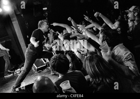 black and white photo of a Jello Biafra and the Guantanamo School of Medicine concert in the Knitting Factory in New York City Stock Photo