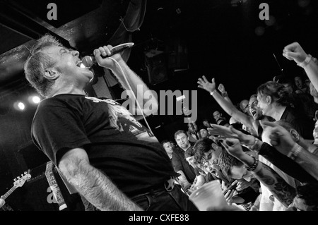 black and white photo of a Jello Biafra and the Guantanamo School of Medicine concert in the Knitting Factory in New York City Stock Photo