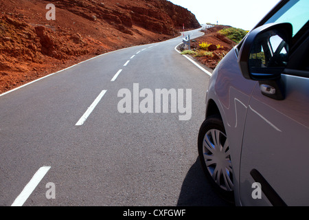 Canary Islands winding road curves and car driving Stock Photo