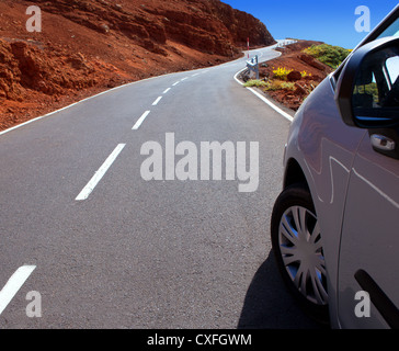 Canary Islands winding road curves and car driving Stock Photo