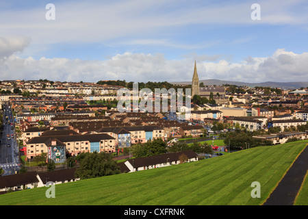 Elevated overview to Catholic Bogside or Nationalist area of the city from walls of Derry Co Londonderry Northern Ireland UK Stock Photo