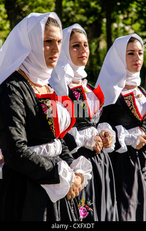 Women wearing a traditional Sardinian costume at the religious feast Sagra del Redentore Nuoro Sardinia Italy Stock Photo