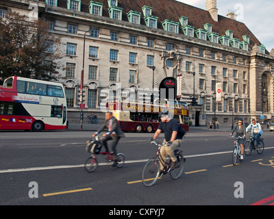 Cyclists on Westminster Bridge Road showing Marriot Hotel in background. Stock Photo