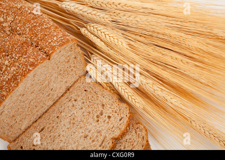 Wheat bread and wheat shocks Stock Photo