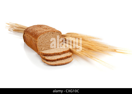 Loaf of wheat bread and a shock of wheat Stock Photo