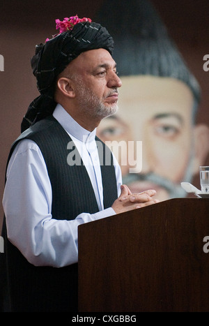 Afghan President Hamid Karzai attends a shura with hundreds of tribal and religious leaders June 14, 2010 in Kandahar, Afghanistan. Stock Photo