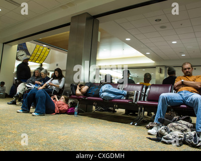 Passengers in Waiting Area, Weather Delay, Fairbanks Airport Terminal, AK, USA Stock Photo