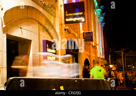 Motion blur of people queueing and entering a night club. Student night at Gatecrasher nightclub, Nottingham, England, UK Stock Photo